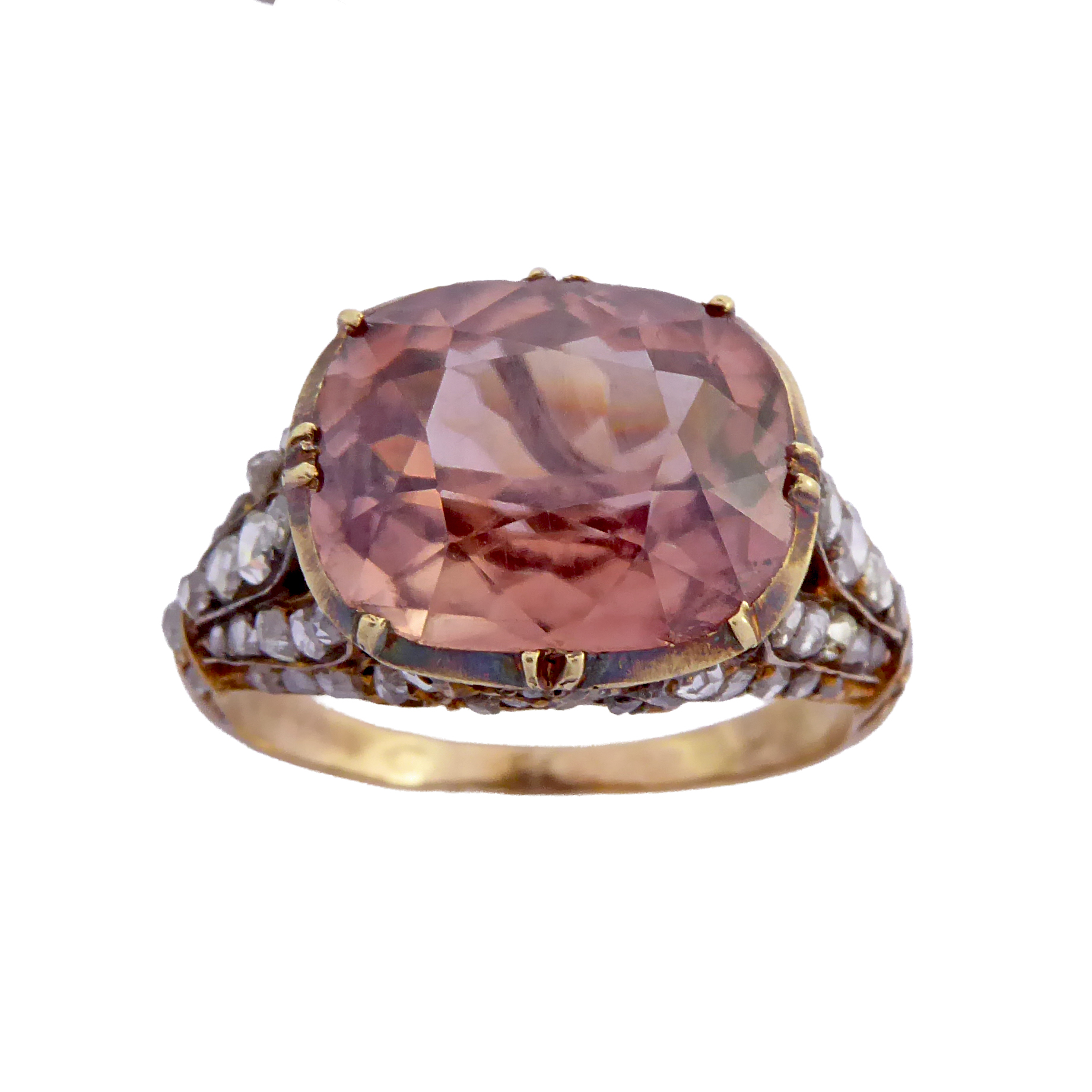 19th century cushion cut brownish-pink zircon and diamond ring, c.1820, the oblong blush-colour cushion zircon oriented landscape, approximately 6.50cts,